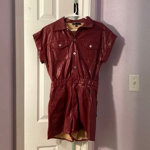 Maroon latex romper, never worn.